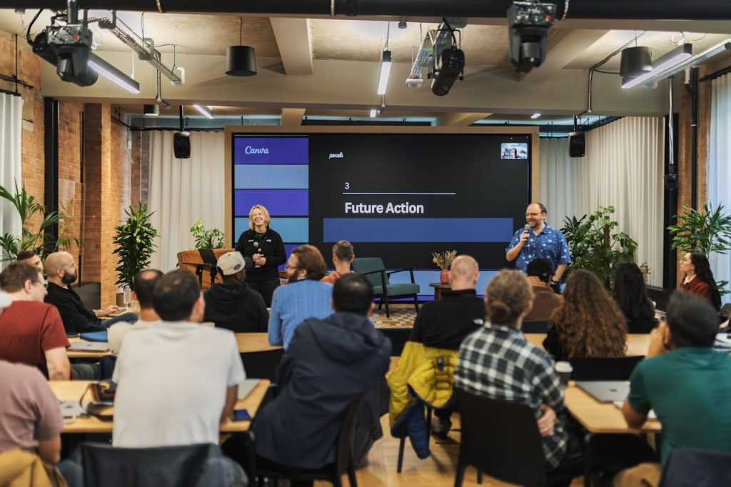 Demo Post 3 Interactive professional presentation in a modern office setting with diverse audience.